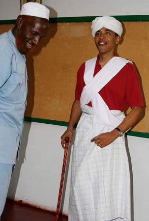 Barack Obama, right, is dressed as a Somali elder by Sheikh Mahmed Hassan, left, during his visit to Wajir in northeastern Kenya, near the borders with Somalia and Ethiopia. AP 2007