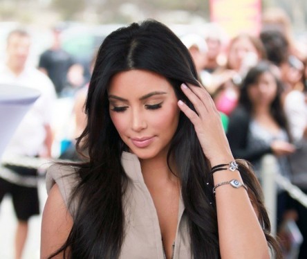 Kim Kardashian - On set sporting a cultural Evil Eye protection bracelet