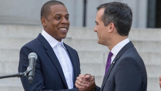 City Of Los Angeles Mayor Eric Garcetti & Sean Carter (Jay Z) o the steps of Los Angeles City Hall. Wednesday April 16, 2014 (Photo by Paul A. Hebert/Invision/AP)