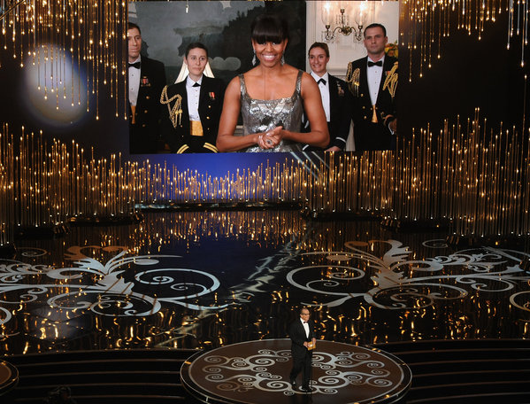 First Lady Michelle Obama, on a video screen via satellite, announces the best picture Oscar with Jack Nicholson, who was at the Dolby Theatre. (Robyn Beck / AFP/Getty Images / February 24, 2013)