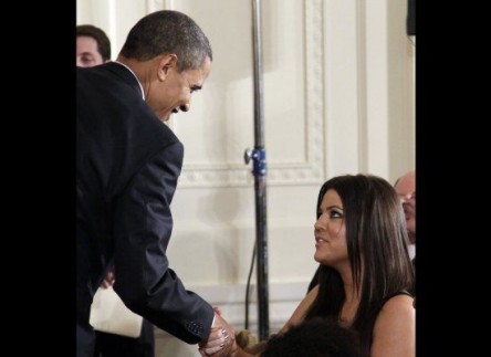 President Obama greets reality star Khloe at White House. January 2010